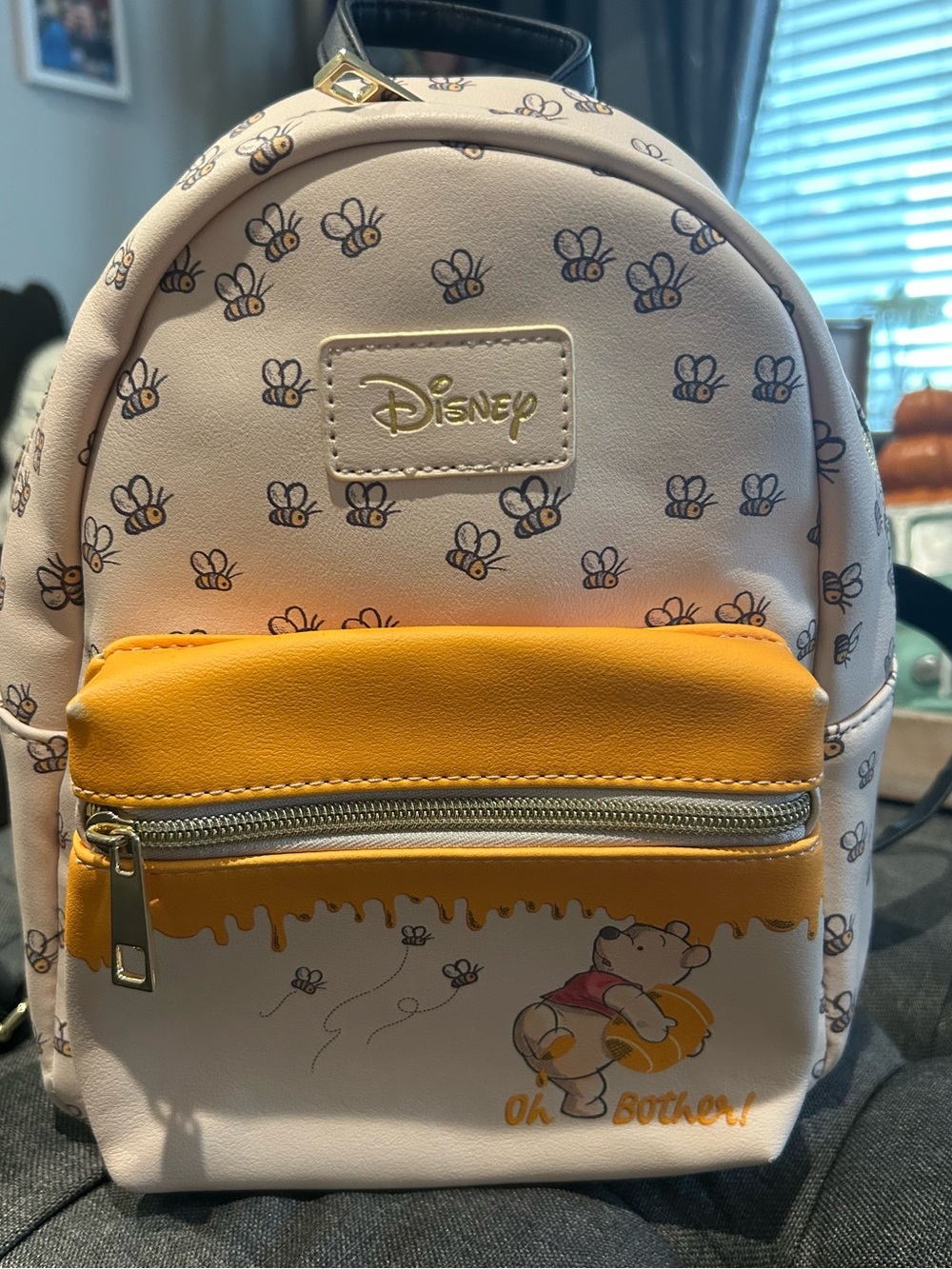 Loungefly Disney Winnie the Pooh Bee Print Mini Backpack in Cream and Yellow